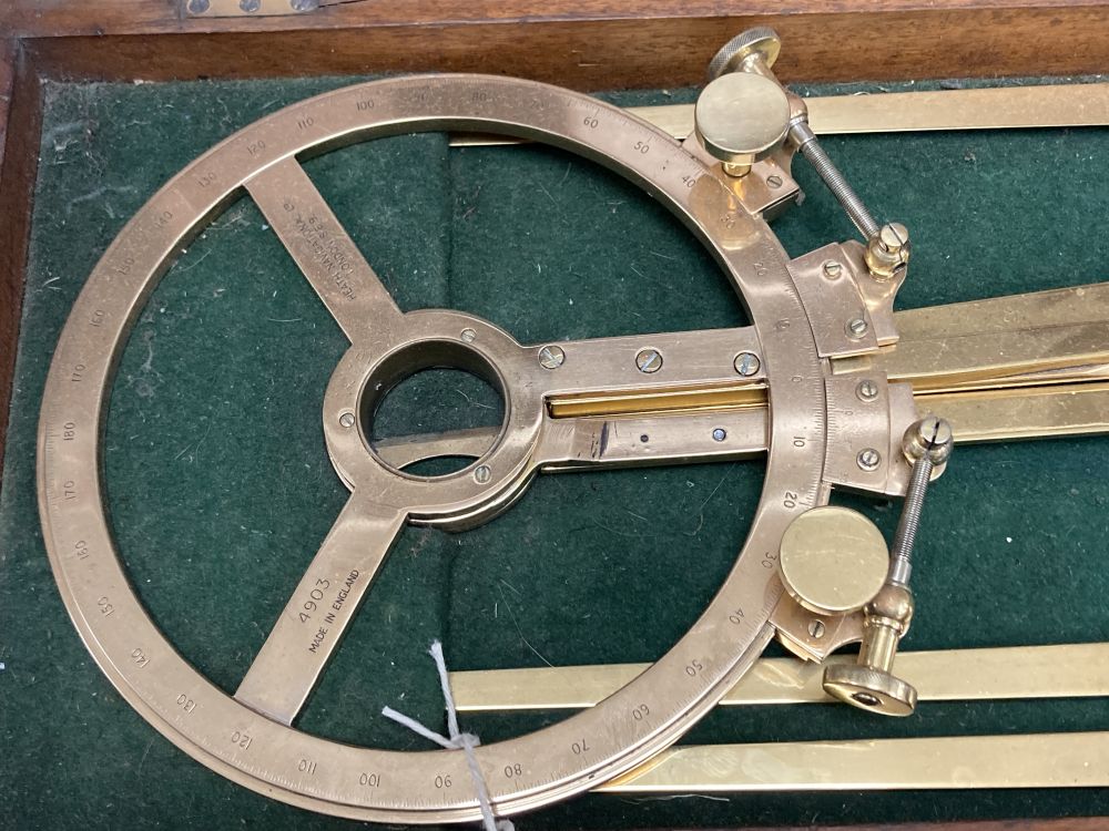 A Heath navigational instrument, mahogany cased, overall length 65cm